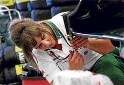 Rare Sight: Briton Antonia Scott of Lotus is the only woman mechanic in the Formula One garage. Reuters