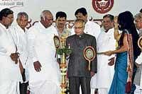 Employees welfare: Union Finance Minister Pranab Mukherjee inaugurating the foundation stone laying ceremony for the Medical Education Complex of Employees State Insurance Corporation in Gulbarga on Saturday. Opposition leader Siddaramaiah, Minister for Medical Education Ramachandra Gowda, Union Labour and Employment Minister Mallikarjun Kharge and former chief minister Dharam Singh are also seen.  dh Photo