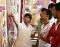 Visitors at an exhibition on ill effects of tobacco use held in front of the Central Railway Station. dh photos