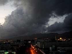 Black clouds loom over Muscat in the early hours of Thursday as authorities begin the evacuation of the Omani island of Masirah over fears that Cyclone Phet might hit the country's east coast on the Arabian Sea, AFP