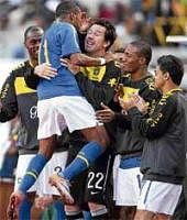 Ecstatic Brazils Robinho celebrates his goal with team-mates during a friendly against Zimbabwe in Harare. AFP