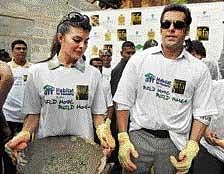 Bollywood actors Salman Khan and Jacqueline Fernandez attend a Habitat for Humanity initiative event for villagers during the three-day IIFA awards events, on the outskirts of Colombo on Thursday. AFP