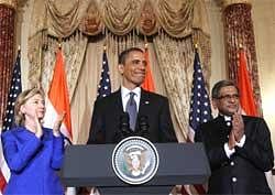 US President Barack Obama with Secretary of State Hillary Clinton (left) and External Affairs Minister S M Krishna during the US-India strategic dialogue reception in Washington on Thursday. AP