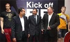 Srinivas Dempo, Chairman and Managing Director of Dempo Sports Club (L), Sanjiv Mehta, Chairman of Amigo Sports and Simon Hawkins (R), Senior Vice President & GM, FIFA & Football Business Unit during the launch of a 2010 FIFA World Cup official merchandise in Mumbai on Thursday. PTI