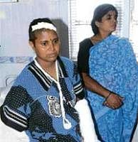 Hurt: Mahadevi (right) who lost her both arms in the accident in which a bus turned turtle in Nepal. DH photo