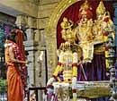 Nithyananda offering pooja at his ashram in Bidadi on Saturday. DH Photo