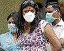 People wait for a checkup outside at a flu ward in Bangalore on August 7, 2009. DH File Photo