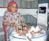 wonder woman: Bhateri Devi with her babies in Hisar on Sunday. pti