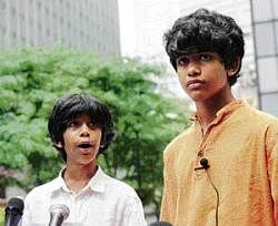 Fight for justice: Kids for a Better Future founder Akash Mehta (left) and his brother Gautama address a press conference in front of a law office representing Union Carbide Corporation and its former CEO Warren Anderson in New York on Monday.  AFP