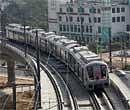 Metro train runs from Qutub Minar station after the inauguration of the new Gurgaon - Qutub metro link in New Delhi on Monday. PTI