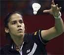 Saina Nehwal of India serves against Eriko Hirose of Japan during the women's singles semifinal rounds at the Indonesia Open Badminton Super Series on Saturday. AP