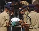 Soldiers of the Central Reserve Police Force, or CRPF receive the body of a slain colleague in Jagdalpur, India, Wednesday, June 30, 2010. A 63-member patrol of the Central Reserve Police Force was ambushed in dense forest Tuesday evening in the Narayanpur district of Chhattisgarh state by Maoist rebels, resulting in the death of at least 27 CRPF men. AP