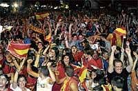 Fan'tastic: Spanish supporters in Madrid go wild after their team stormed into the semifinals on Saturday. AFP