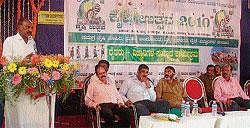 Zilla Krishika Samaja President Machetira Chotu Kaveriappa speaking at the valedictory of krishi utsav at Gonikoppa.