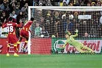 Costly Miss: Ghanas Asamoah Gyan shoots the crucial penalty against the crossbar in the quarterfinal match against Uruguay. AFP