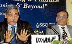 RBI Deputy Governor K C Chakrabarty (left) with Assocham Vice President A N Dhoot at the conference on Banking & Beyond  Power of Financial Inclusion, in Kolkata, on Sunday. pti