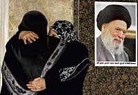 Shiite women mourn next to a poster of Lebanons top Shiite cleric Ayatollah Mohammed Hussein Fadlallah at a mosque in Beirut, Lebanon, on Sunday. AP