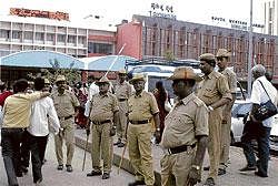 Alert mode: Police security at City railway station on the eve of Bharath bundh on Sunday. DH photo