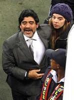 Argentina head coach Diego Maradona and his daughter Gianina leave the pitch after the World Cup quarterfinal soccer match between Argentina and Germany at Cape Town, South Africa, on Saturday.  AP Photo