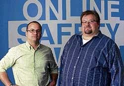 Geoffrey Arone, left, and Michael Clark, SafetyWebs founders, at their office in Denver. SafetyWebs services scour the Web to create reports for parents of everything a child is doing online. NYT