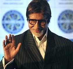 Indian movie icon Amitabh Bachchan waves as he leaves after a media conference of television show "Kaun Banega Crorepati" in Mumbai, India, Wednesday. AP