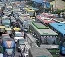 GRIDLOCK: Traffic on Seshadri Road came to a virtual standstill as the KPCC took out a protest rally on Wednesday in Bangalore. DH PHOTO