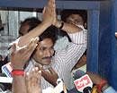 Congress MP Y.S.Jagan Mohan Reddy greeting his supporters before boarding a train for his Odarpu yatra at the Secunderabad railway station on Wednesday. PTI Photo