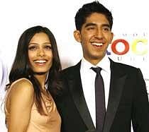 Dev Patel with 'Slumdog Millionaire' co-actor Freida Pinto. File Photo/Reuters