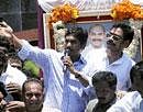 Congress MP Y S Jagan Mohan Reddy addressing supporters during his Odarpu Yatra at Icchapuram in Srikakulam district on Thursday. PTI