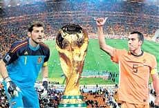 It wil be a battle of equals between the Netherlands and first-time World Cup final entrants Spain  at the Soccer City Stadium on Sunday, with captains Giovanni van Bronckhorst (right) and Iker Casillas leading from the front.