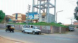A view of the land for the proposed underpass or over-bridge in front of Madikeri District Hospital.  DH Photo