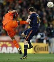 Netherlands Nigel De Jong (right) gets nasty with Spains Xabi Alonso during their bitterly-fought final in Johannesburg on Sunday. AP