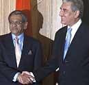 Indian External Affairs Minister S.M. Krishna, right, shakes hands with his Pakistani counterpart Shah Mahmood Qureshi prior to formal talks at the Foreign Ministry in Islamabad, Pakistan on Thursday. AP
