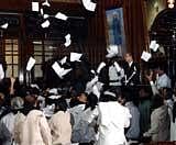 Opposition party MLAs stage a dharna during assembly session at Vidhana Soudha in Bangalore on Thursday. -KPN