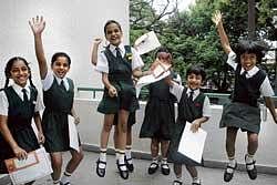 Students of Bishop Cotton Girls School in a joyous mood at the Annual Prize Day celebration in Bangalore on Thursday. DH Photo