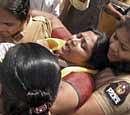 Women police personnel carrying away one of the TDP activists who were protesting the arrest of party president N Chandrababu Naidu by Maharastra police, in Hyderabad. AP