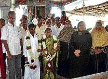Kader Batcha, his wife and Muslim women from his family blessing the wedding of their adopted Hindu girl to a Hindu boy at a Kali temple at Tiruchirappalli in Tamil Nadu. DH photo