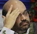 In this photo taken on March 28, 2010, Gujarat state Home Minister Amit Shah gestures during a convocation ceremony of the Gujarat National Law University in Ahmadabad, India. Shah was summoned by the Central Bureau of Investigation (CBI) to appear before it Thursday July 22, 2010, in connection with the Sohrabuddin Sheikh fake encounter case but he failed to show up, according to news reports. AP