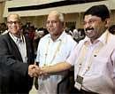Karnataka Chief Minister B S Yeddyurappa shares a light moment with Textiles Minister Dayanidhi Maran and Goa Chief Minister Digambar Kamat   at the 55th meeting of National Development Council at Vigyan Bhavan in New Delhi on Saturday. PTI