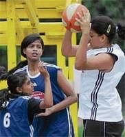 Keen Tussle: Roshini (right) of Mount Fever attempts to get past Bharath Mercurys Varsha (left) in the Mahindra NBA Challenge tournament on Saturday. DH Photo