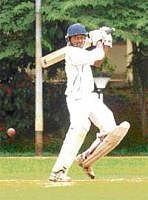 Class Act: Devraj T Patil of President's XI cuts en route to his 135 against Combined XI on the second day of their Safi Darashah Trophy cricket tournament match. Dh Photo