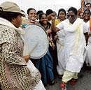 Dance to the party tune Leader of the Opposition in the Legislative Council Motamma and other women leaders of the Congress dancing during the padayatra at Beguru. DH photo
