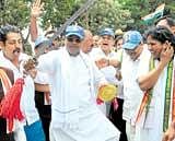 Dance of democracy: Leader of the Opposition in the Legislative Assembly Siddaramaiah performing Veeragase,  in Nelamangala on Monday, the second day of their padayatra. dh photo/B H Shivakumar