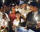 tribute: Former minister Shobha Karandlaje participating in the candle light event to mark Kargil Vijay Divas at MG Road on Monday. DH Photo