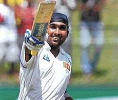 Unstoppable Force: Sri Lankan vice-captain Mahela Jayawardene acknowledges the crowd after reaching his hundred against India on the second day of the second Test at the SSC ground, Colombo, on Tuesday. Reuters