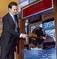 UK Chancellor of Exchequer George Osborne strikes the opening bell during his visit to the Bombay Stock Exchange in Mumbai on Wednesday. PTI