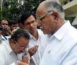 Chief Minister BS Yaddyurappa listens to people at Krishna in Bangalore on Thursday. --KPN