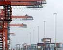 Idle cranes and containers are seen at the Port Newark Container Terminal near New York City in Newark, New Jersey in this picture taken July 2, 2009.  REUTERS