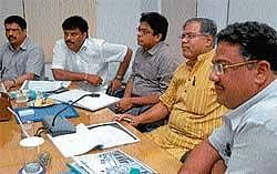 District-In-Charge Minister S Sureshkumar, Deputy Commissioner Harsh Gupta, Mayor Sandesh Swamy, MLA Tanveer Sait  and MLC SIddaraju at a meeting to monitor progress of works, held in Mysore on Wednesday. DH photo