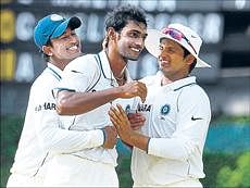 Abhimanyu Mithun (centre), Suresh Raina (right) and Pragyan Ojha came up with crucial contributions in the Test series against Lanka. AFP
